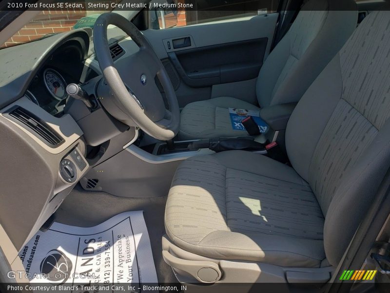 Sterling Grey Metallic / Medium Stone 2010 Ford Focus SE Sedan
