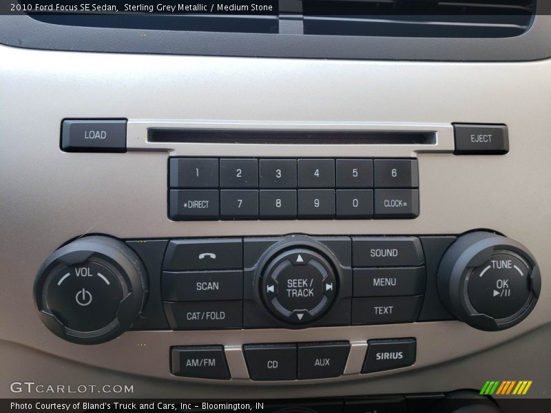 Sterling Grey Metallic / Medium Stone 2010 Ford Focus SE Sedan