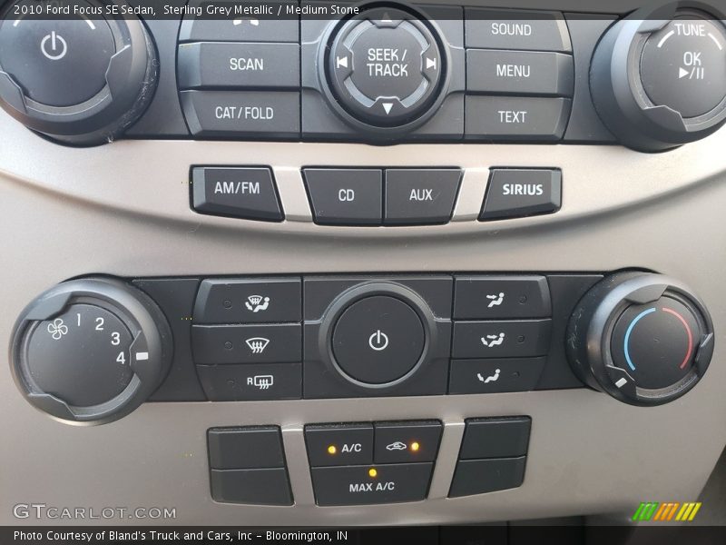 Sterling Grey Metallic / Medium Stone 2010 Ford Focus SE Sedan