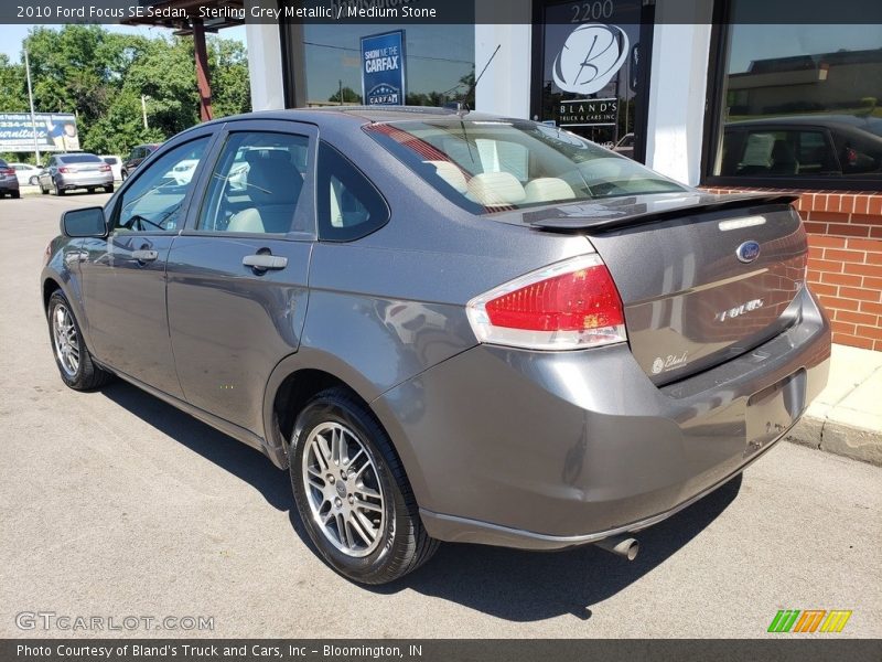 Sterling Grey Metallic / Medium Stone 2010 Ford Focus SE Sedan