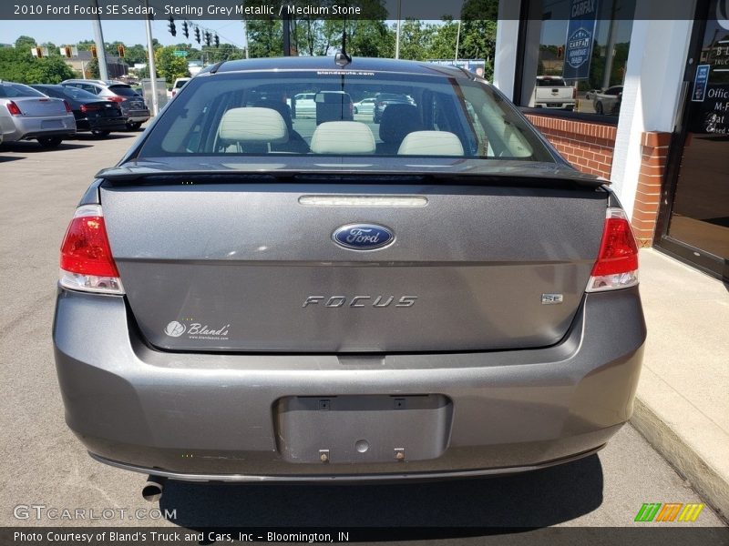 Sterling Grey Metallic / Medium Stone 2010 Ford Focus SE Sedan