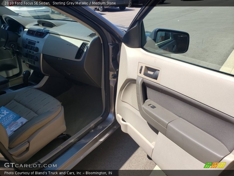Sterling Grey Metallic / Medium Stone 2010 Ford Focus SE Sedan