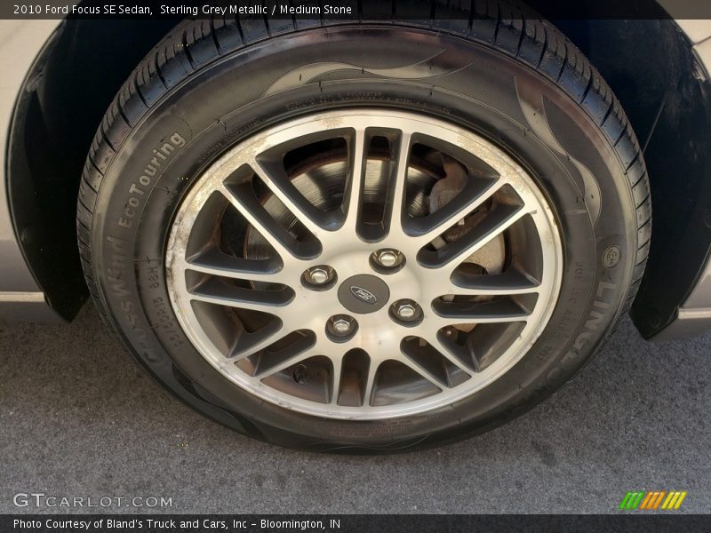 Sterling Grey Metallic / Medium Stone 2010 Ford Focus SE Sedan