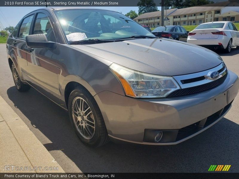 Sterling Grey Metallic / Medium Stone 2010 Ford Focus SE Sedan