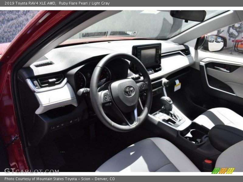 Ruby Flare Pearl / Light Gray 2019 Toyota RAV4 XLE AWD
