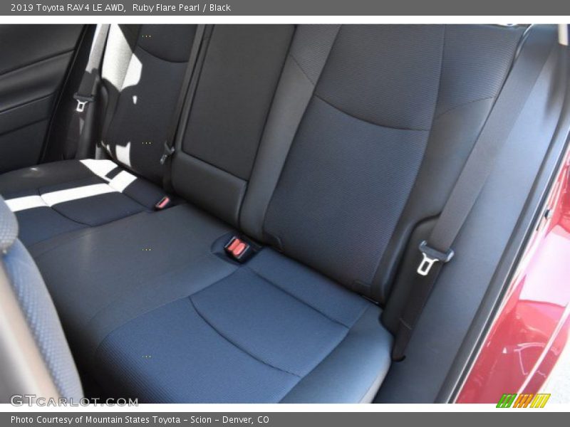 Ruby Flare Pearl / Black 2019 Toyota RAV4 LE AWD