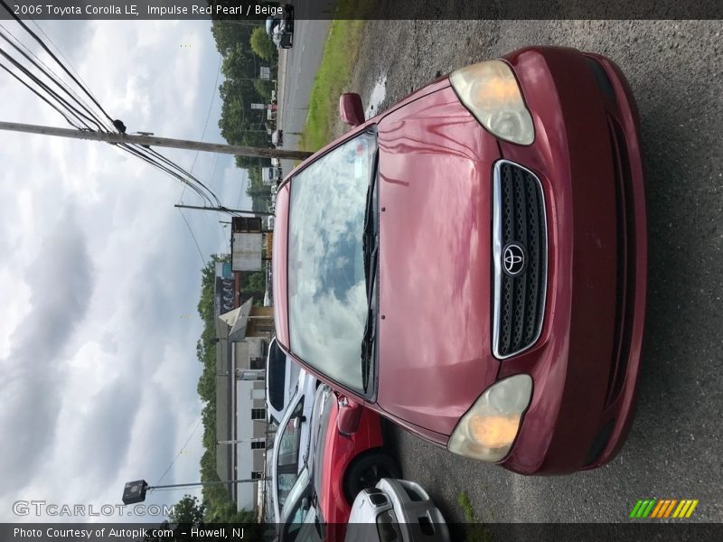 Impulse Red Pearl / Beige 2006 Toyota Corolla LE