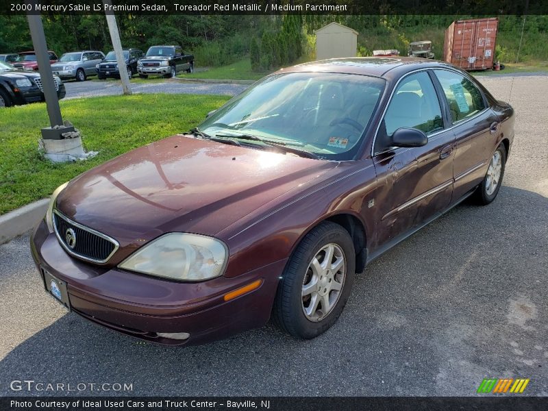 Toreador Red Metallic / Medium Parchment 2000 Mercury Sable LS Premium Sedan