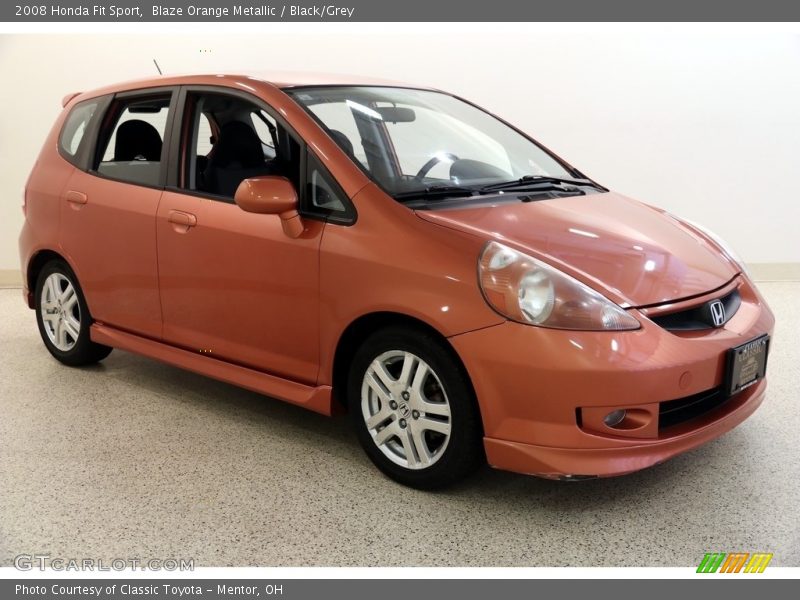 Blaze Orange Metallic / Black/Grey 2008 Honda Fit Sport