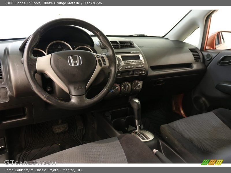 Blaze Orange Metallic / Black/Grey 2008 Honda Fit Sport
