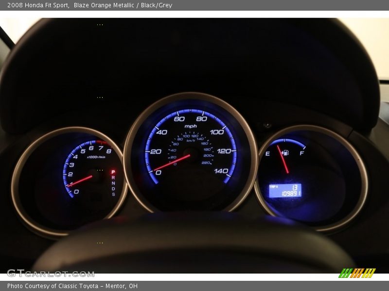 Blaze Orange Metallic / Black/Grey 2008 Honda Fit Sport