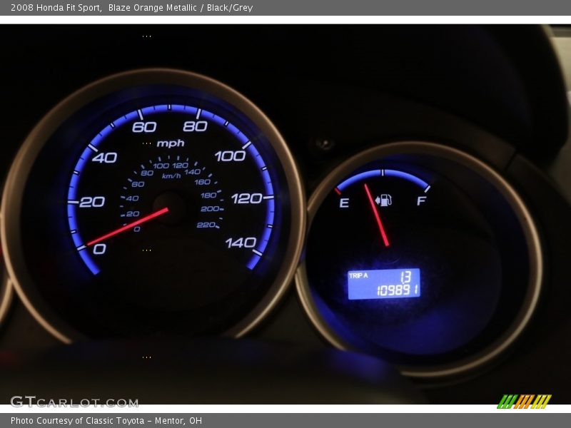 Blaze Orange Metallic / Black/Grey 2008 Honda Fit Sport