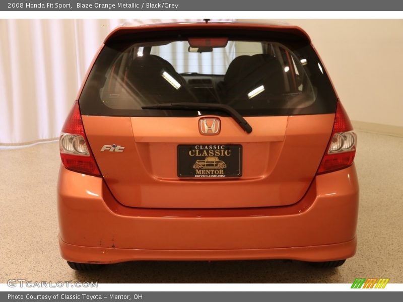 Blaze Orange Metallic / Black/Grey 2008 Honda Fit Sport