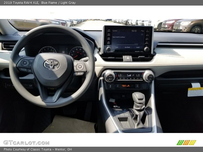 Blue Flame / Light Gray 2019 Toyota RAV4 XLE