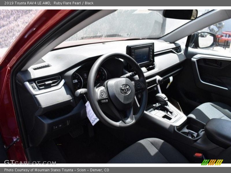 Ruby Flare Pearl / Black 2019 Toyota RAV4 LE AWD