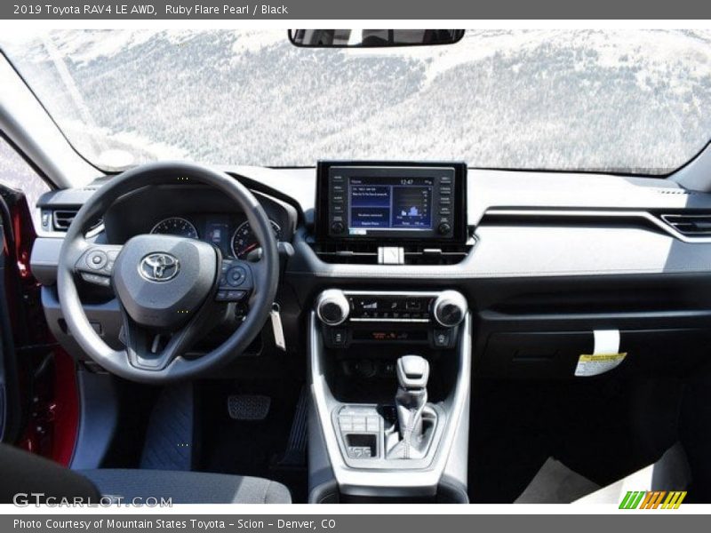 Ruby Flare Pearl / Black 2019 Toyota RAV4 LE AWD