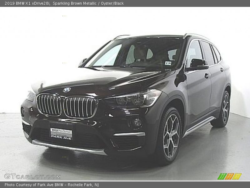 Sparkling Brown Metallic / Oyster/Black 2019 BMW X1 xDrive28i