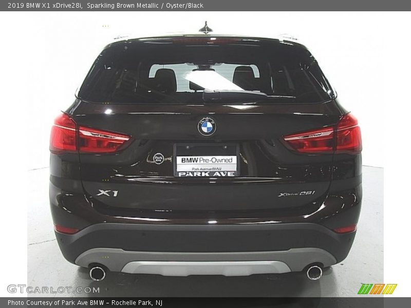 Sparkling Brown Metallic / Oyster/Black 2019 BMW X1 xDrive28i