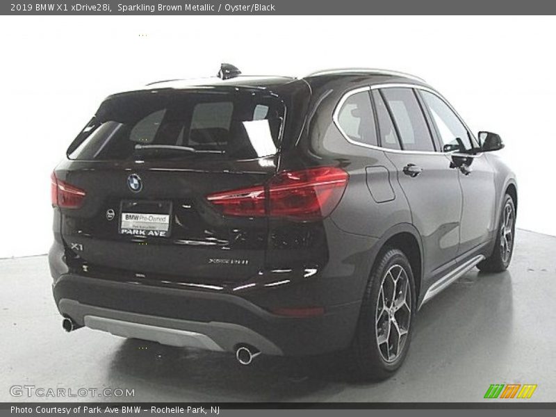 Sparkling Brown Metallic / Oyster/Black 2019 BMW X1 xDrive28i