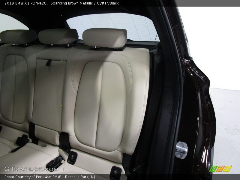 Sparkling Brown Metallic / Oyster/Black 2019 BMW X1 xDrive28i