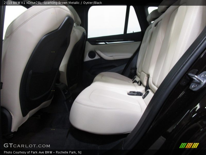 Sparkling Brown Metallic / Oyster/Black 2019 BMW X1 xDrive28i