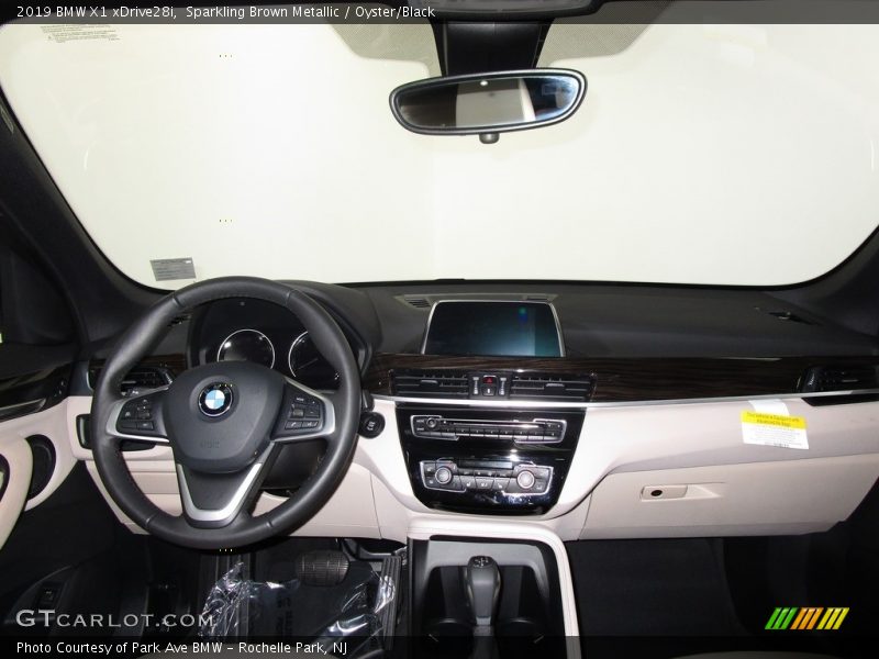 Sparkling Brown Metallic / Oyster/Black 2019 BMW X1 xDrive28i