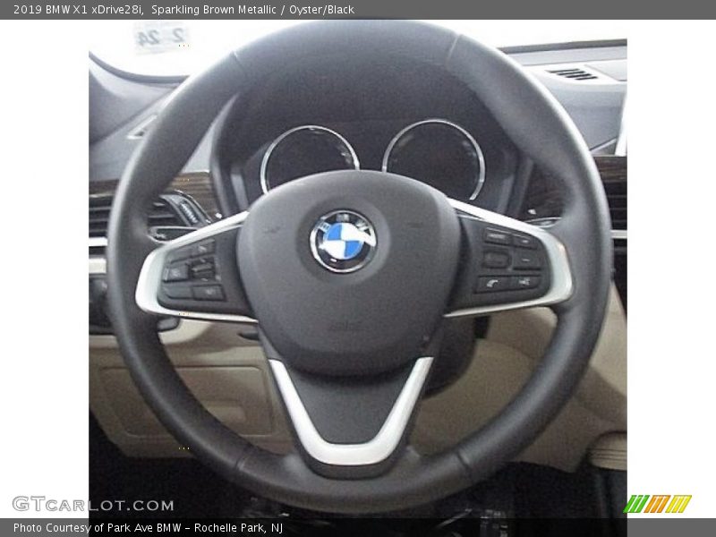 Sparkling Brown Metallic / Oyster/Black 2019 BMW X1 xDrive28i