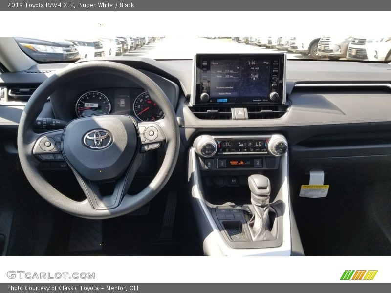 Super White / Black 2019 Toyota RAV4 XLE