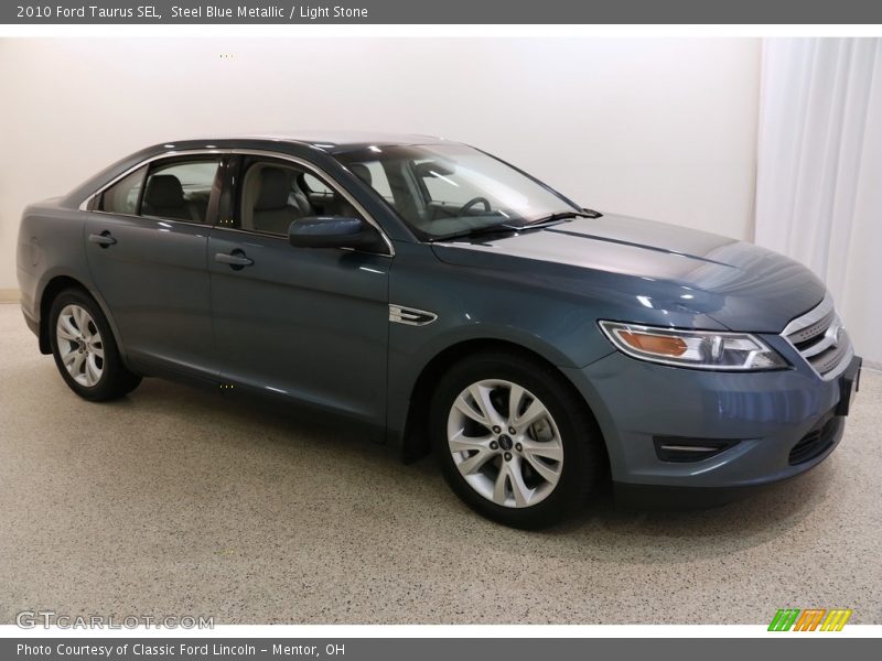 Steel Blue Metallic / Light Stone 2010 Ford Taurus SEL
