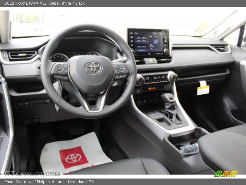 Super White / Black 2019 Toyota RAV4 XLE