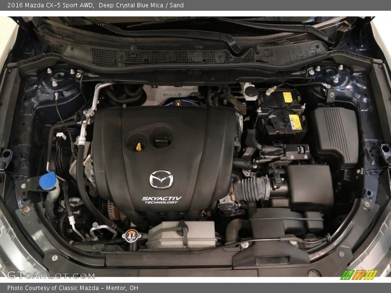 Deep Crystal Blue Mica / Sand 2016 Mazda CX-5 Sport AWD