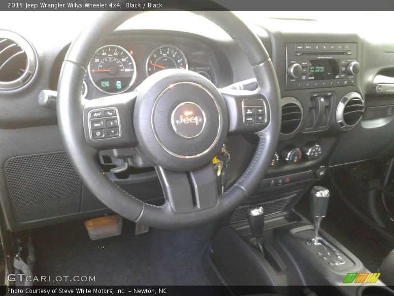 Black / Black 2015 Jeep Wrangler Willys Wheeler 4x4
