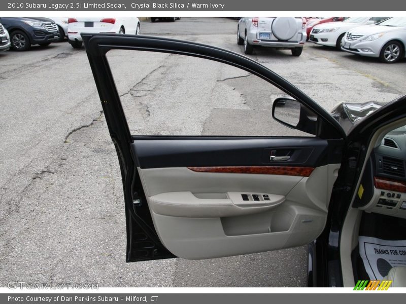 Crystal Black Silica / Warm Ivory 2010 Subaru Legacy 2.5i Limited Sedan