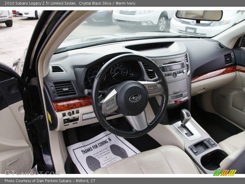 Crystal Black Silica / Warm Ivory 2010 Subaru Legacy 2.5i Limited Sedan
