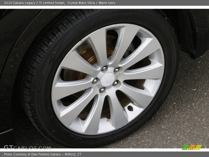 Crystal Black Silica / Warm Ivory 2010 Subaru Legacy 2.5i Limited Sedan