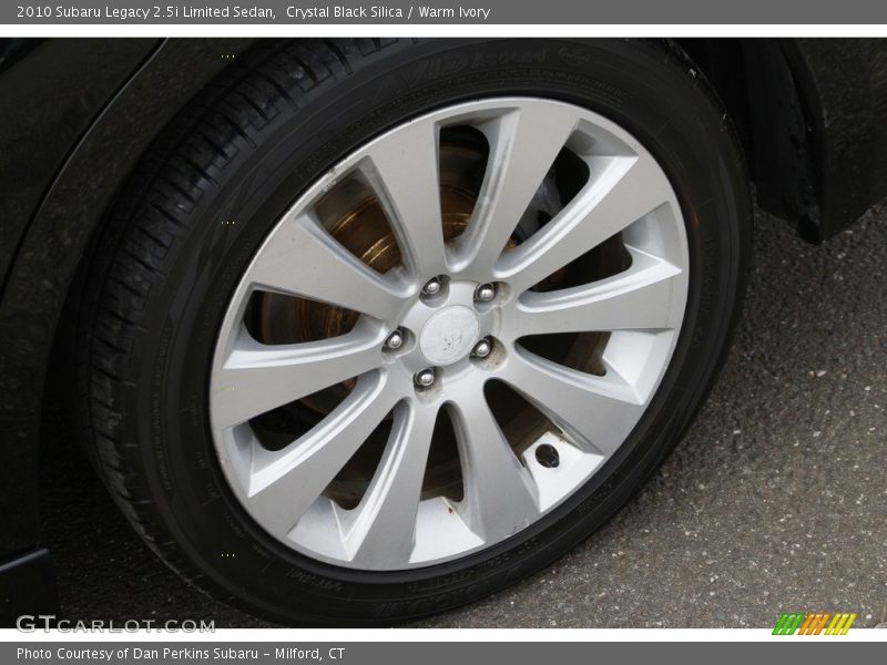 Crystal Black Silica / Warm Ivory 2010 Subaru Legacy 2.5i Limited Sedan