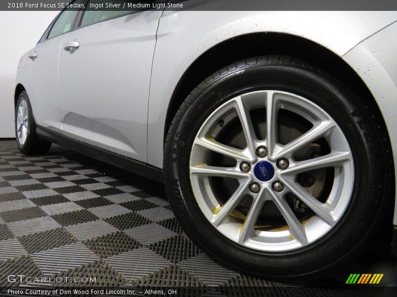 Ingot Silver / Medium Light Stone 2018 Ford Focus SE Sedan