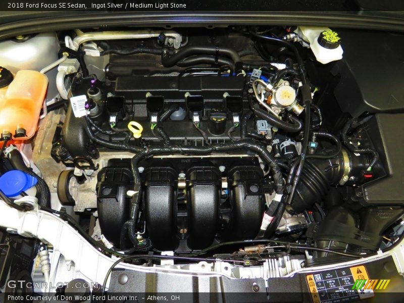 Ingot Silver / Medium Light Stone 2018 Ford Focus SE Sedan