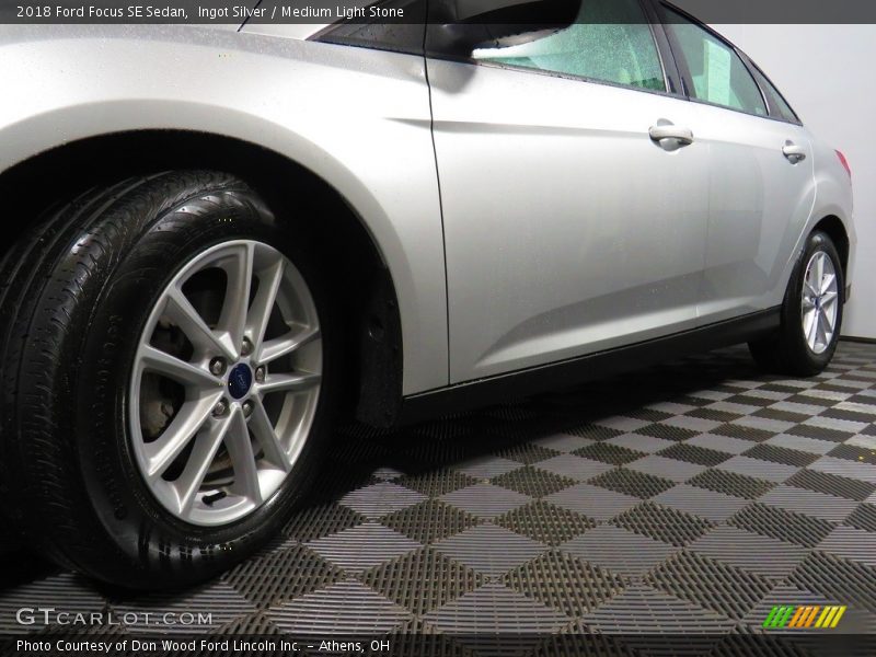 Ingot Silver / Medium Light Stone 2018 Ford Focus SE Sedan