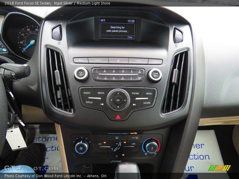 Ingot Silver / Medium Light Stone 2018 Ford Focus SE Sedan