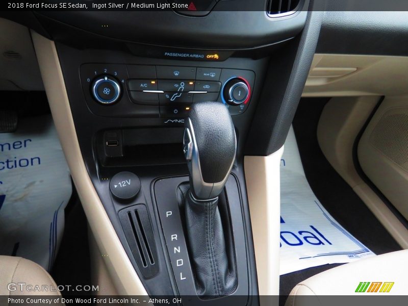 Ingot Silver / Medium Light Stone 2018 Ford Focus SE Sedan