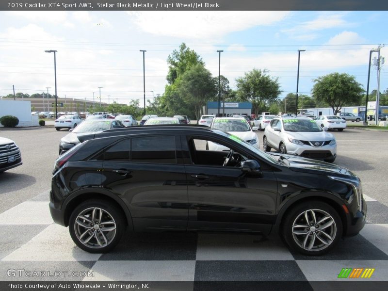 Stellar Black Metallic / Light Wheat/Jet Black 2019 Cadillac XT4 Sport AWD