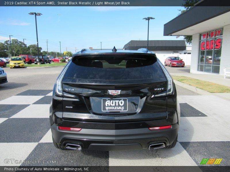 Stellar Black Metallic / Light Wheat/Jet Black 2019 Cadillac XT4 Sport AWD