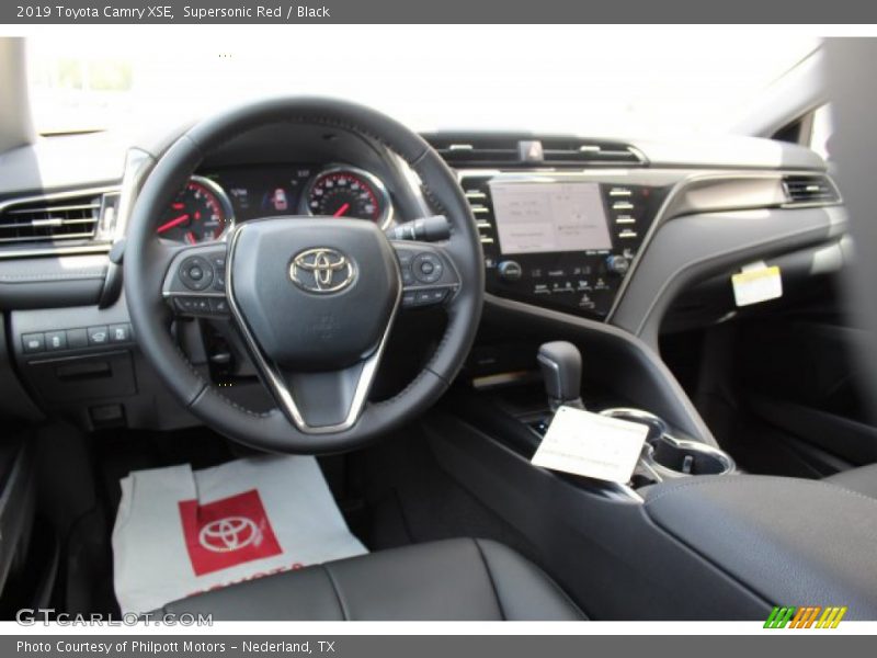 Supersonic Red / Black 2019 Toyota Camry XSE