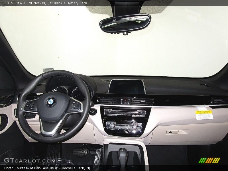 Jet Black / Oyster/Black 2019 BMW X1 xDrive28i
