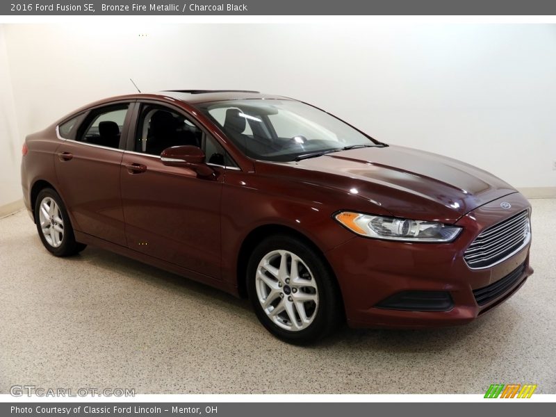 Bronze Fire Metallic / Charcoal Black 2016 Ford Fusion SE