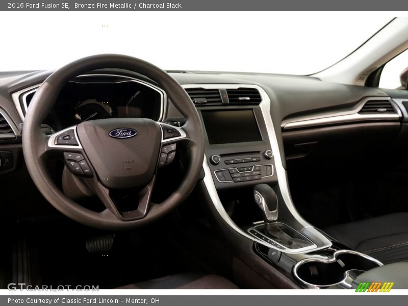 Bronze Fire Metallic / Charcoal Black 2016 Ford Fusion SE