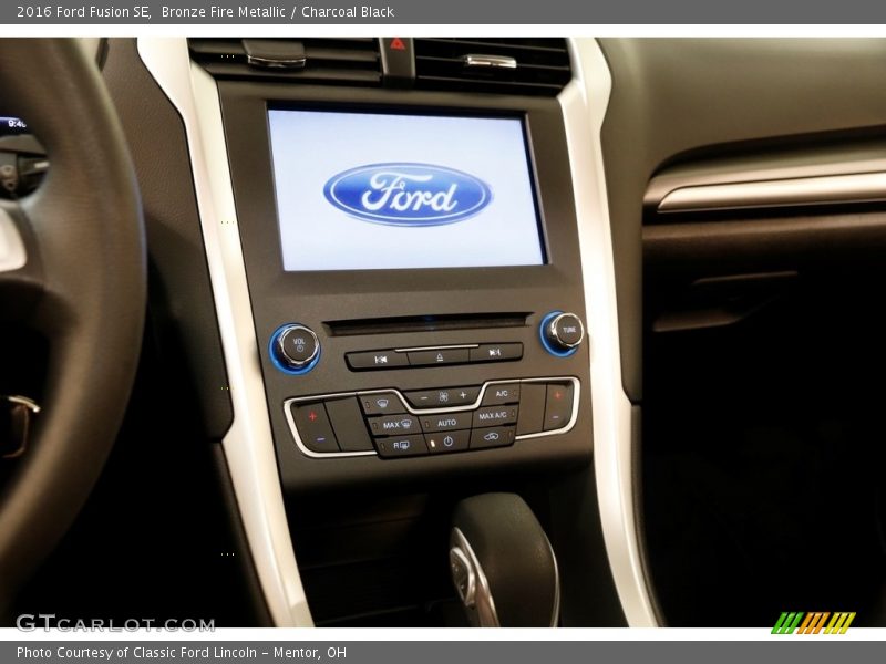 Bronze Fire Metallic / Charcoal Black 2016 Ford Fusion SE