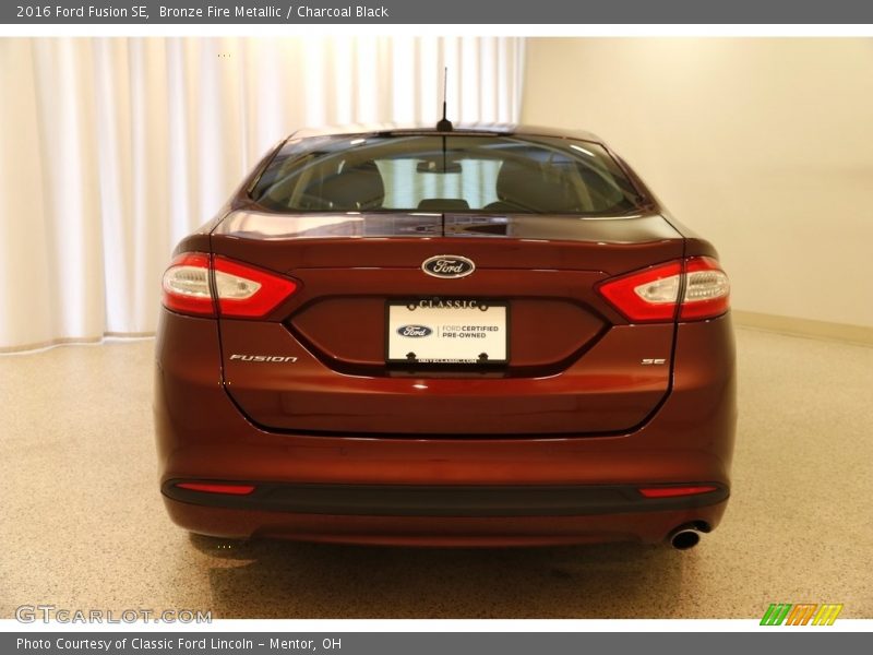 Bronze Fire Metallic / Charcoal Black 2016 Ford Fusion SE