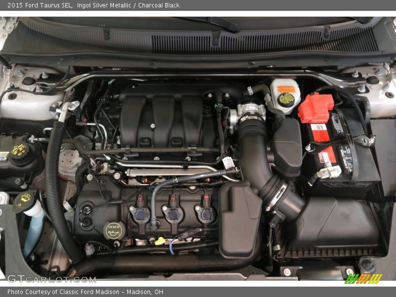 Ingot Silver Metallic / Charcoal Black 2015 Ford Taurus SEL